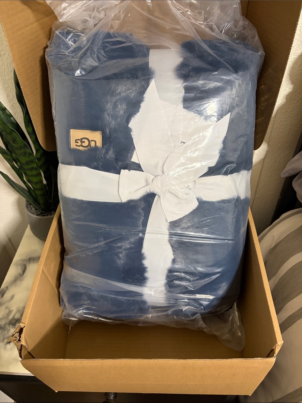 UGG Navy Plush Throw with White Bow Accent Patch
